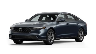 3/4 front view of black Honda Accord on white space. 