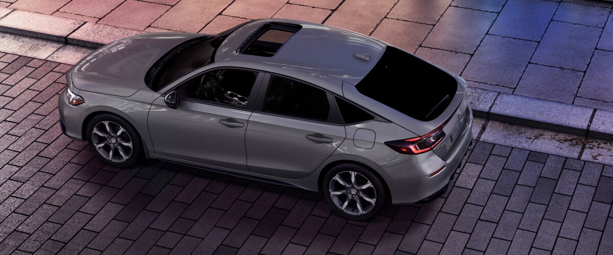 Overhead shot of grey hatchback.