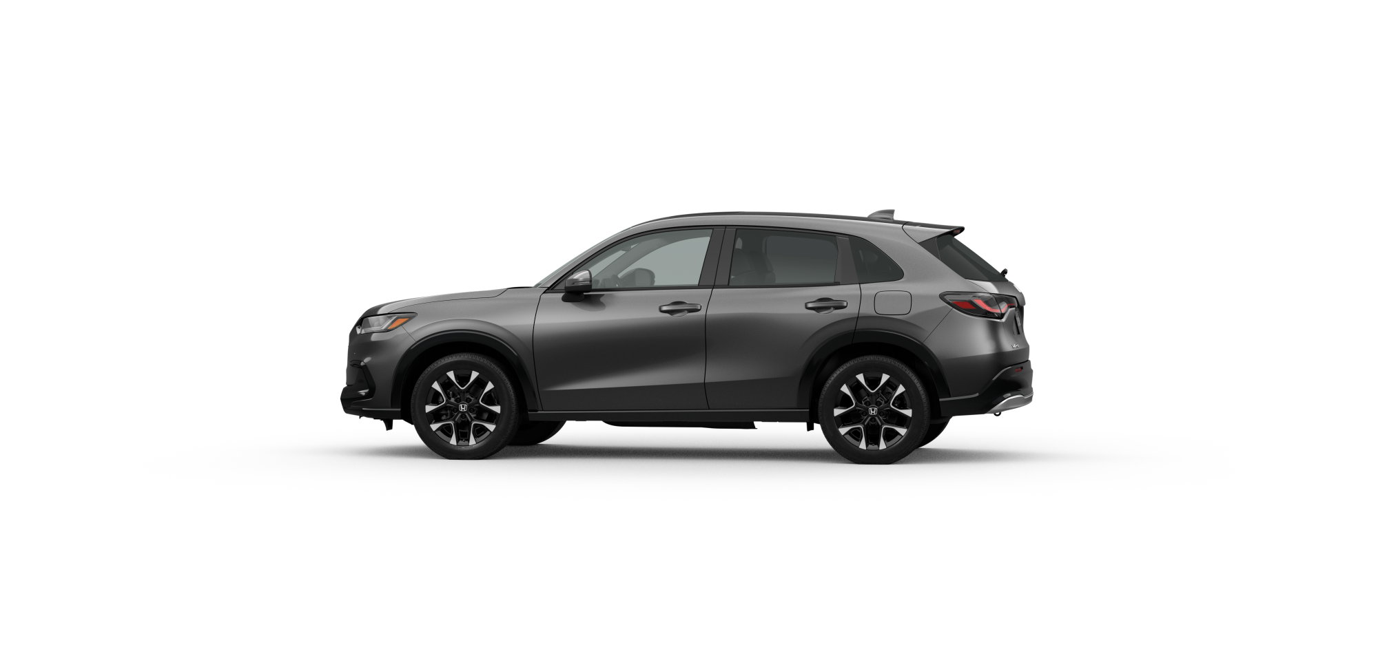 Side driver-side view of 2026 HR-V EX-L in Modern Steel Metallic colour on white space. 