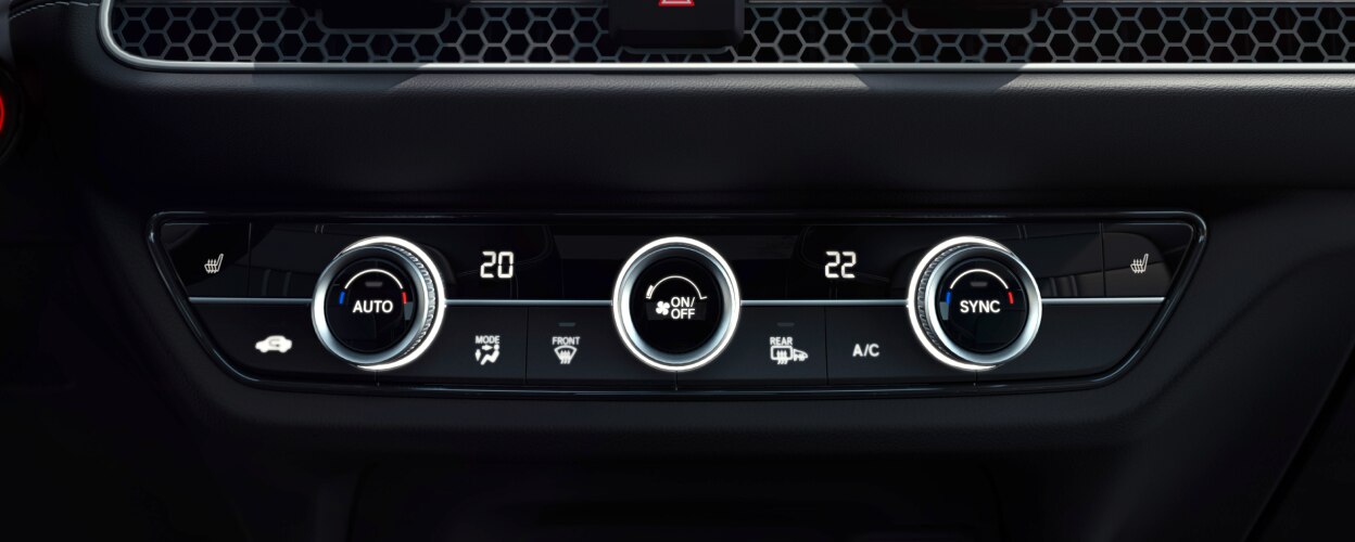 Closeup of climate control dials.