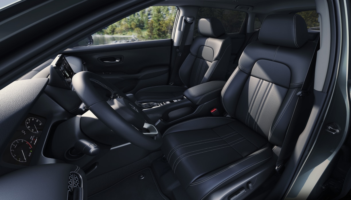 Interior wide view of black front seats in the HR-V.