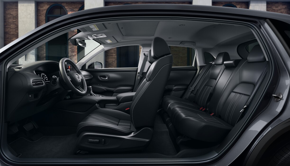 Panoramic sideview of the front and rear seats.