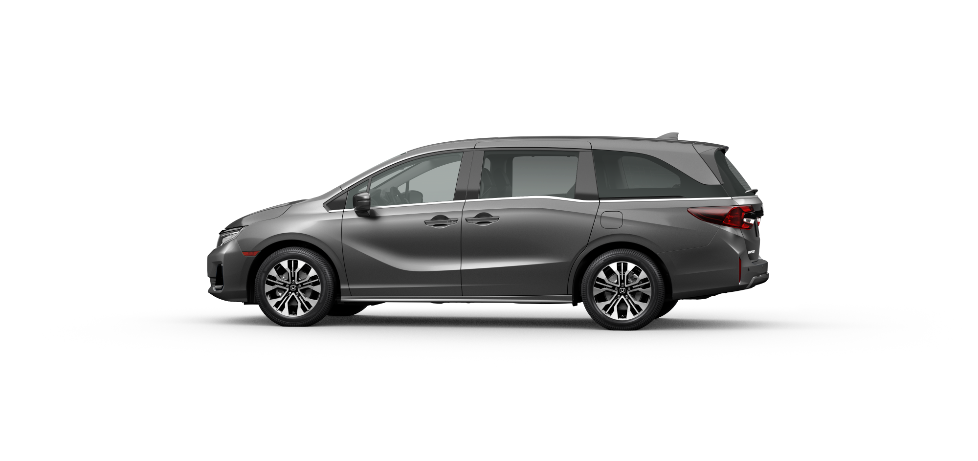 Side driver-side view of 2025 Odyssey Elite in Modern Steel Metallic colour on white space. 