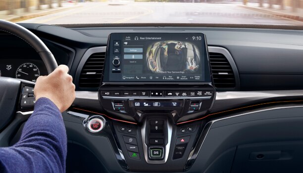 Closeup of touchscreen display projecting the kids in back rows.