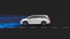 3/4 rear view of Odyssey. Blue sensor waves and lines emit from the front.