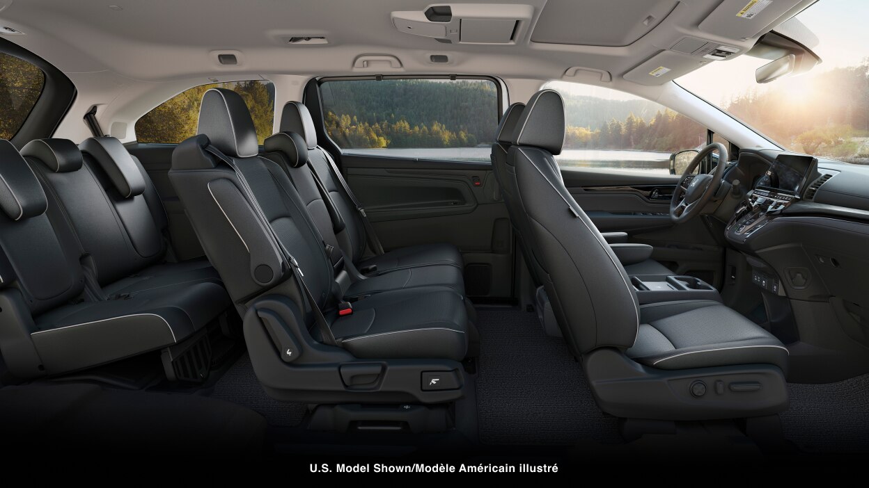 Wide side view of front and second row seats in an Odyssey.