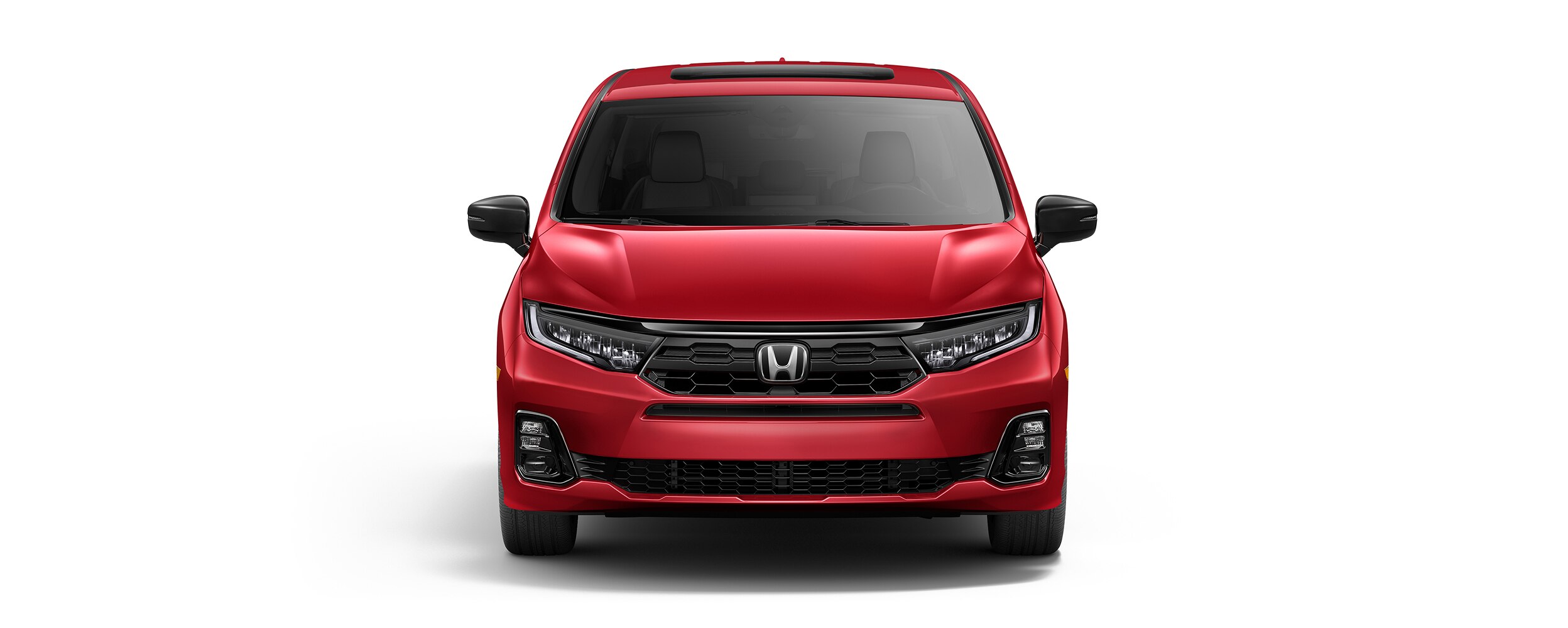 Wide front view of red Odyssey on white space.