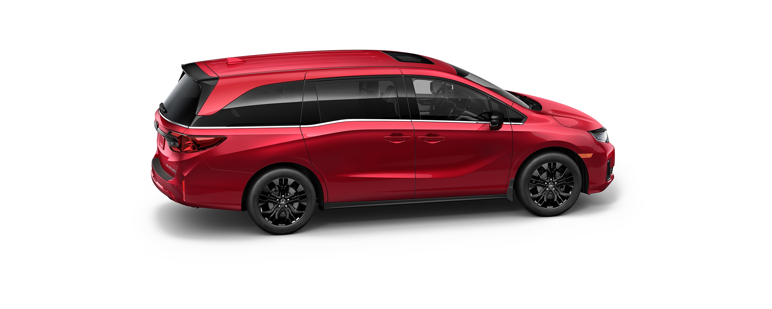 3/4 bird’s eye side view of red Odyssey on white space.