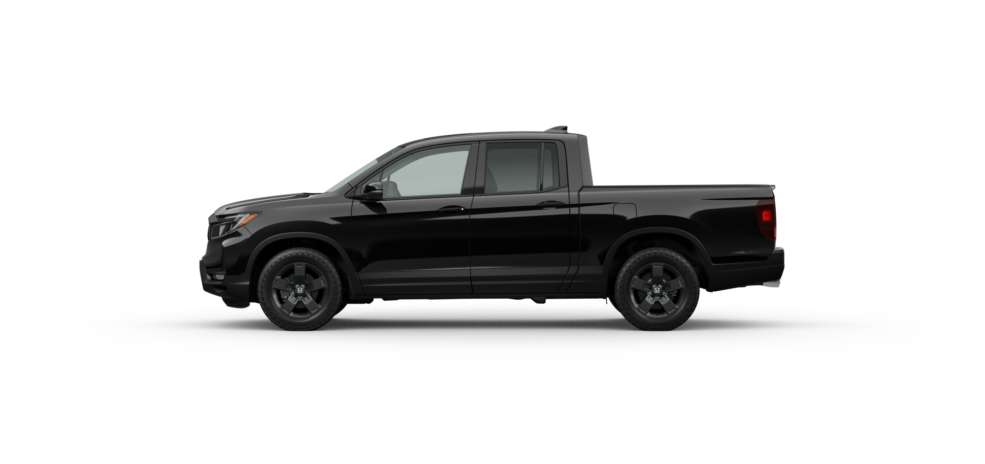 Side driver-side view of 2025 Ridgeline Black Edition in Crystal Black Pearl colour on white space. 