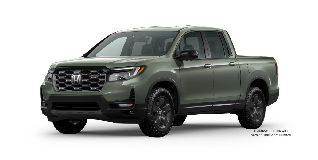 3/4 front view of a ash green metallic Ridgeline on white space.