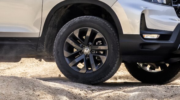 Closeup of black aluminum-alloy wheel on Ridgeline